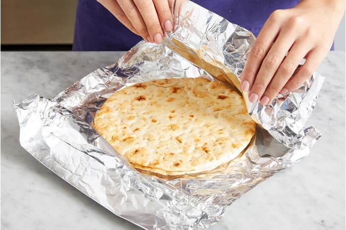 recipe-step-image-Warm the pitas & serve your dish 