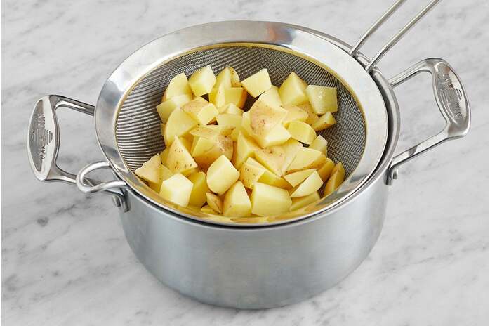 recipe-step-image-Prepare & parboil the potatoes