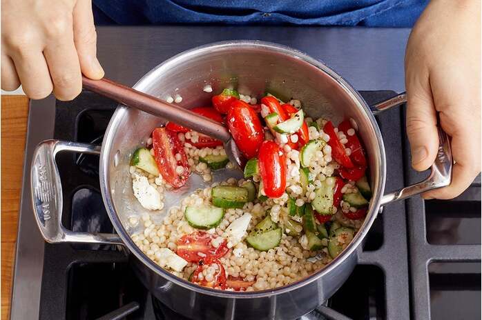 recipe-step-image-Finish the couscous & serve your dish