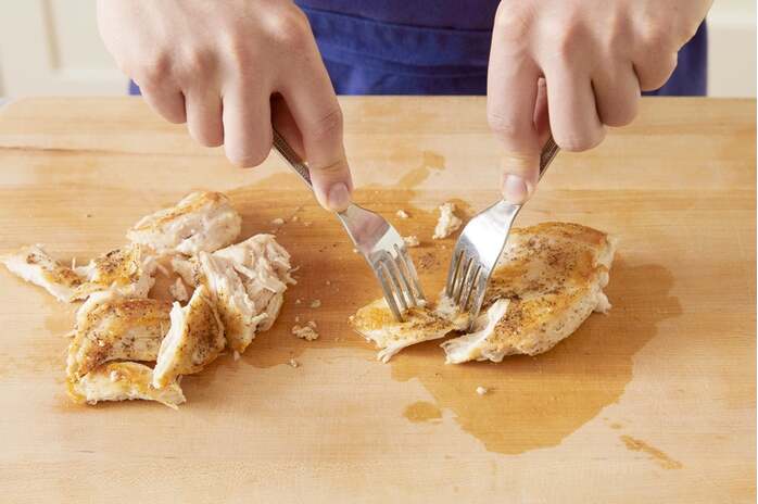 recipe-step-image-Cook & shred the chicken: