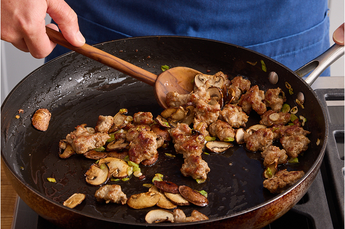 recipe-step-image-Cook the pork & mushrooms
