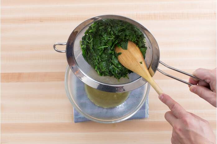recipe-step-image-Cook & drain the spinach: