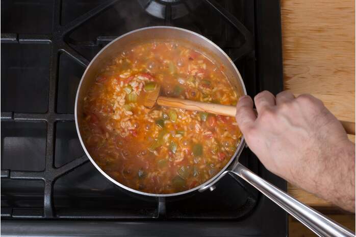 recipe-step-image-Add the tomatoes & water: