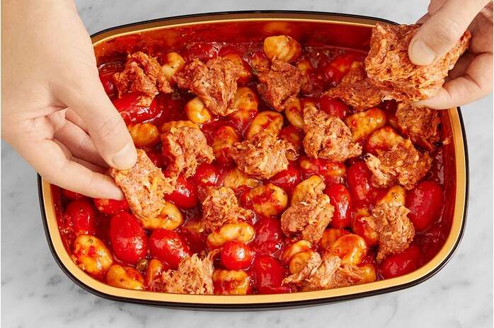 recipe-step-image-Add the sausage & bake the tray
