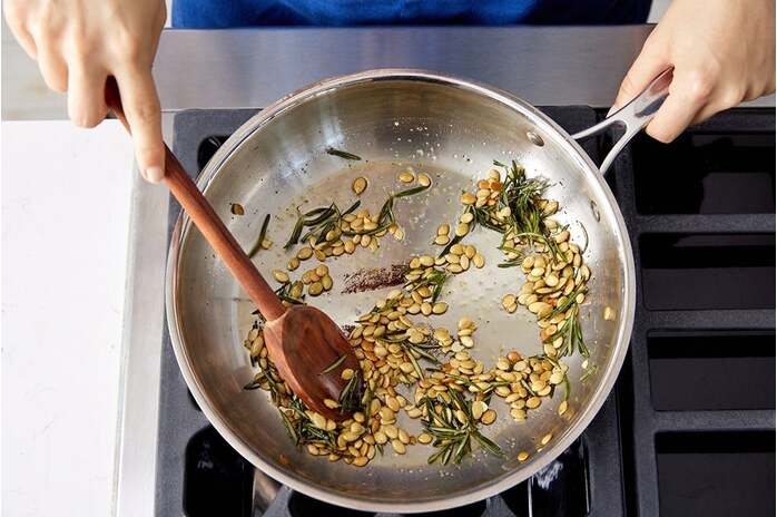 recipe-step-image-Fry the pepitas & rosemary
