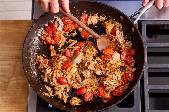 recipe-step-image-Cook the pork & tomatoes