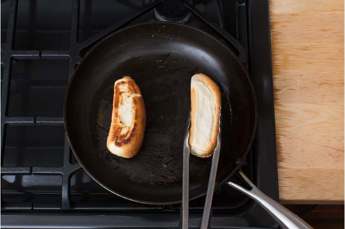 recipe-step-image-Toast the buns & make the sandwiches:
