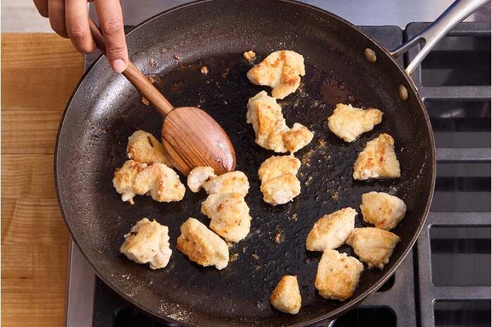 recipe-step-image-Coat & cook the chicken