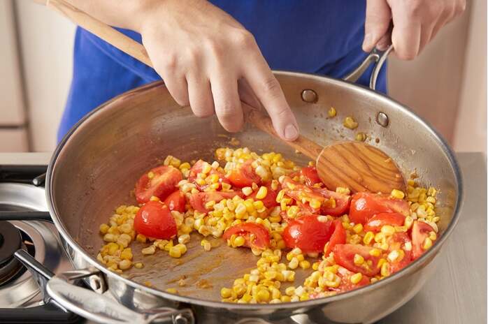 recipe-step-image-Cook the corn & tomatoes: