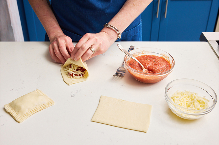 recipe-step-image-Assemble the pizza pockets 