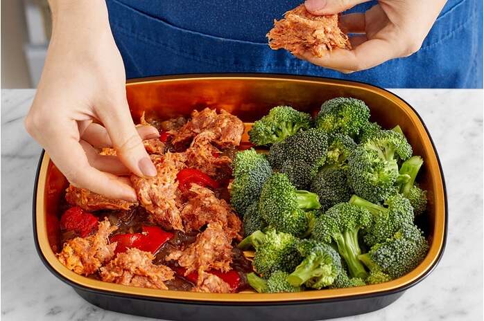 recipe-step-image-Add the sausage & bake the tray