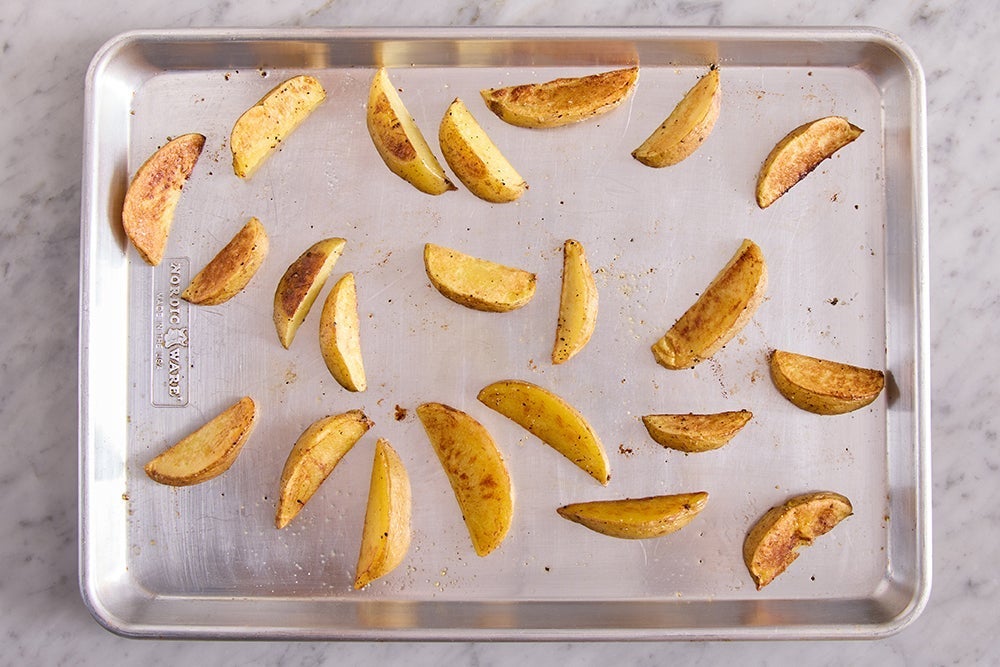 recipe-step-image-Roast the potato wedges }