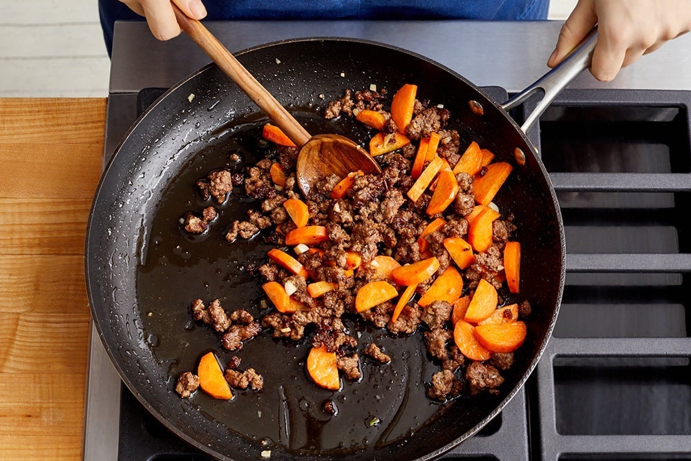 recipe-step-image-Add the carrots & garlic}