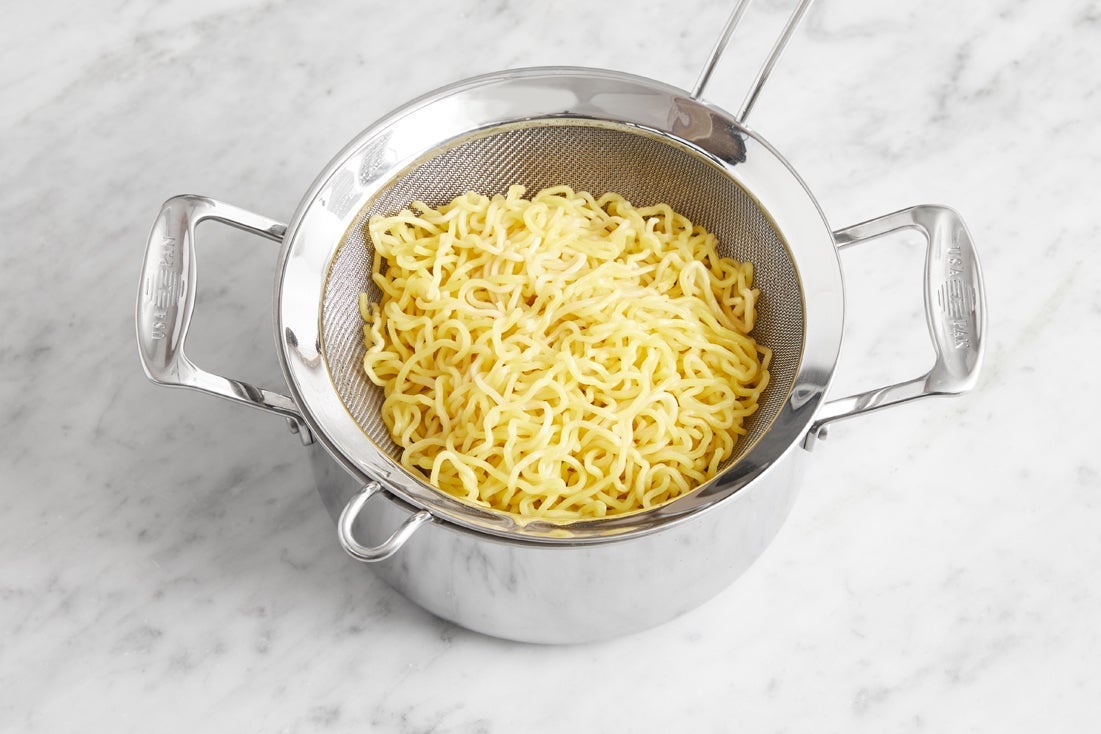 recipe-step-image-Cook & finish the noodles }