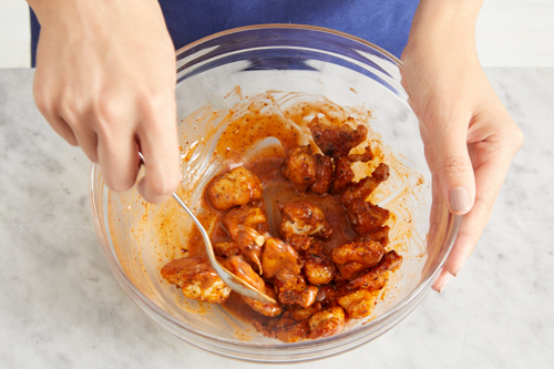 recipe-step-image-Coat, cook & dress the chicken}