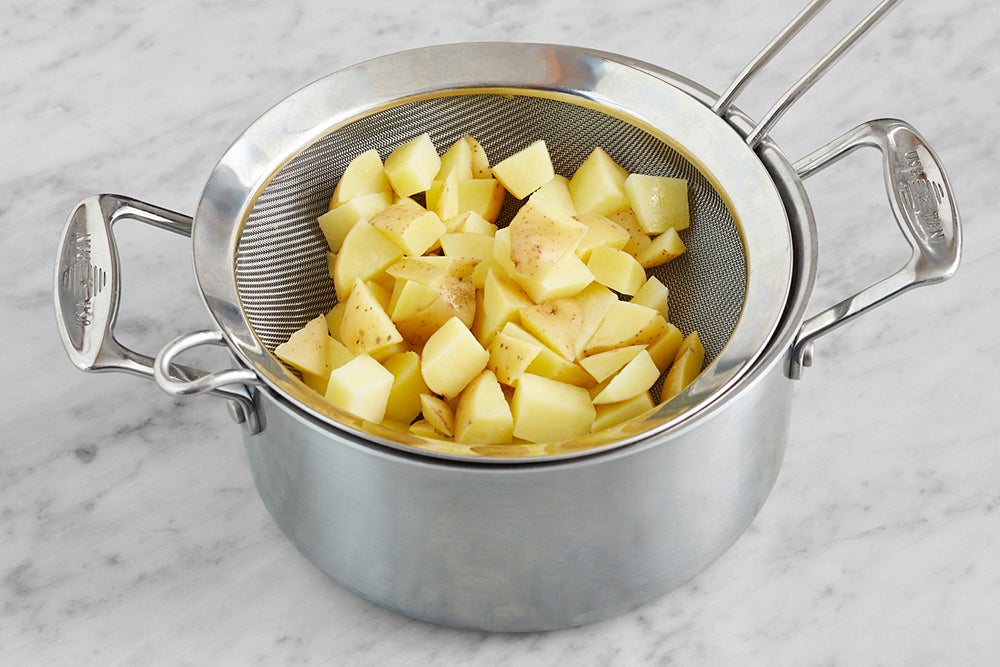 recipe-step-image-Prepare & parboil the potatoes}
