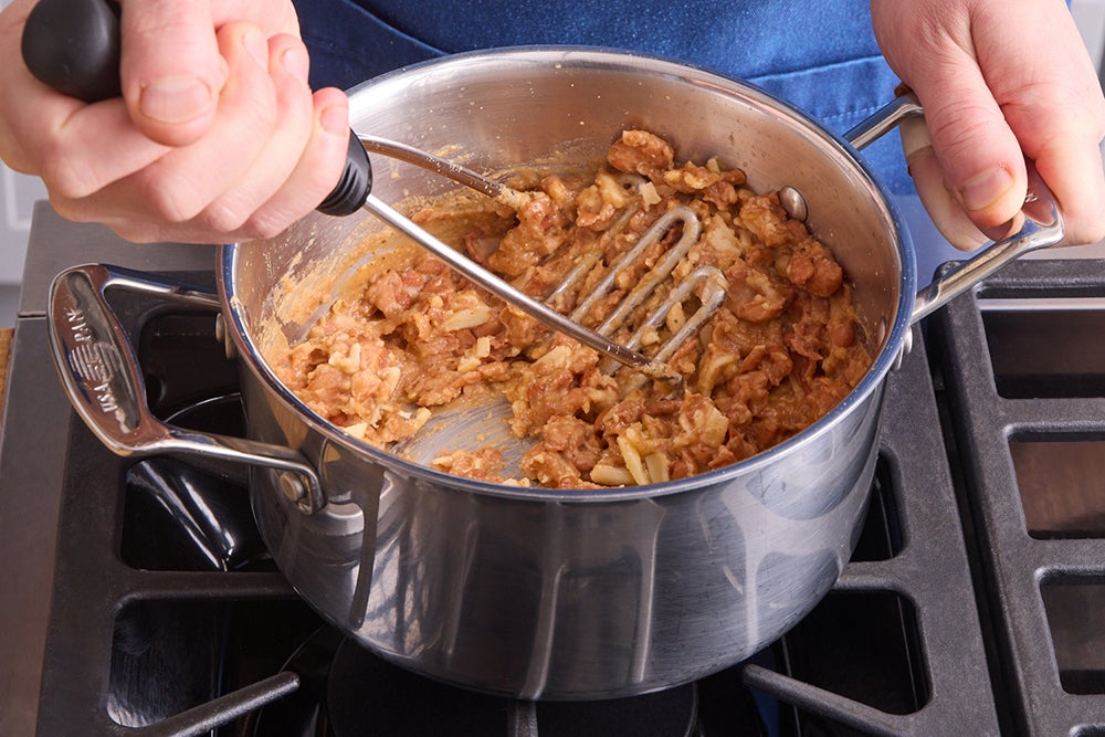 recipe-step-image-Make the cheesy beans}