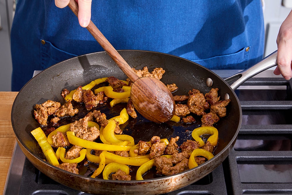recipe-step-image-Cook the sausage & pepper}
