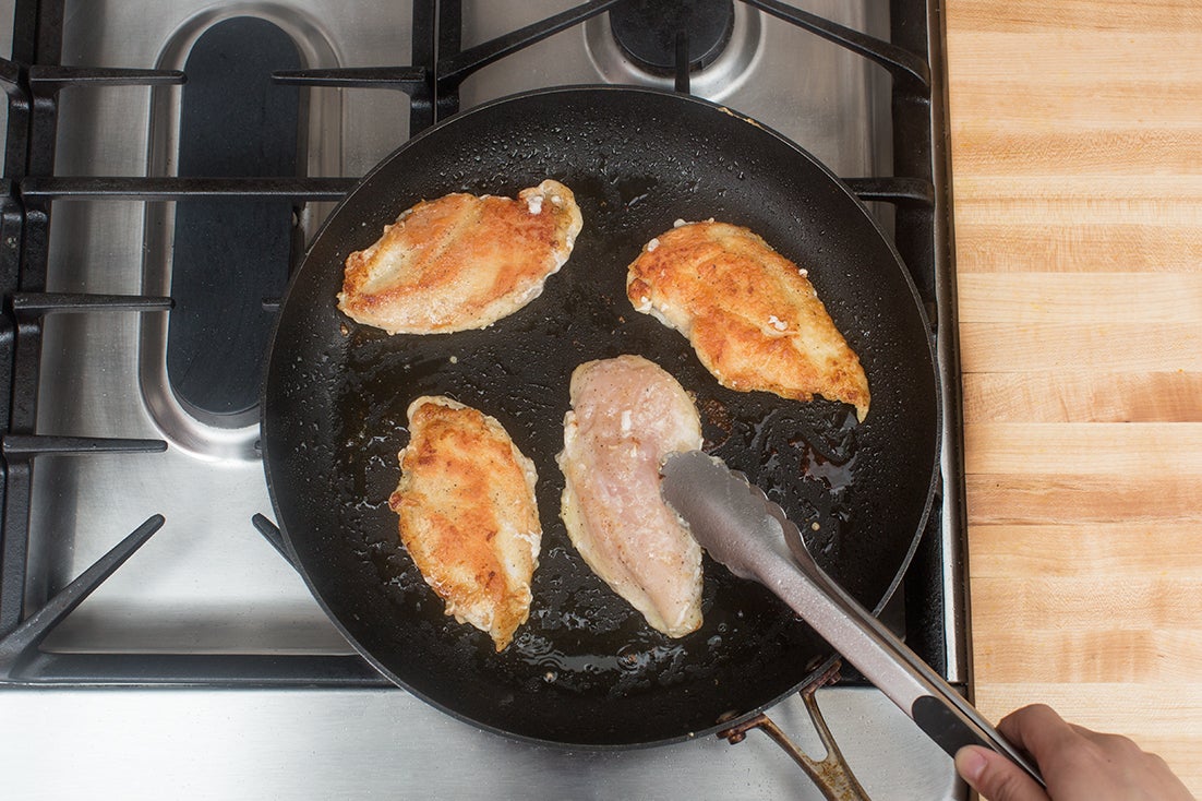 recipe-step-image-Coat & cook the chicken:}