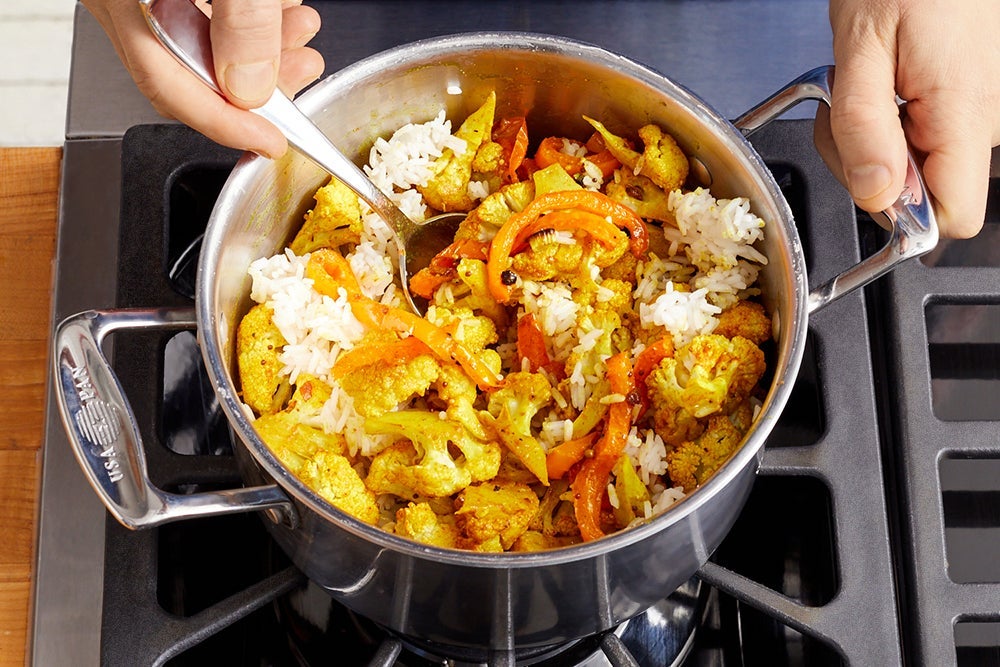 recipe-step-image-Finish the rice & serve your dish}