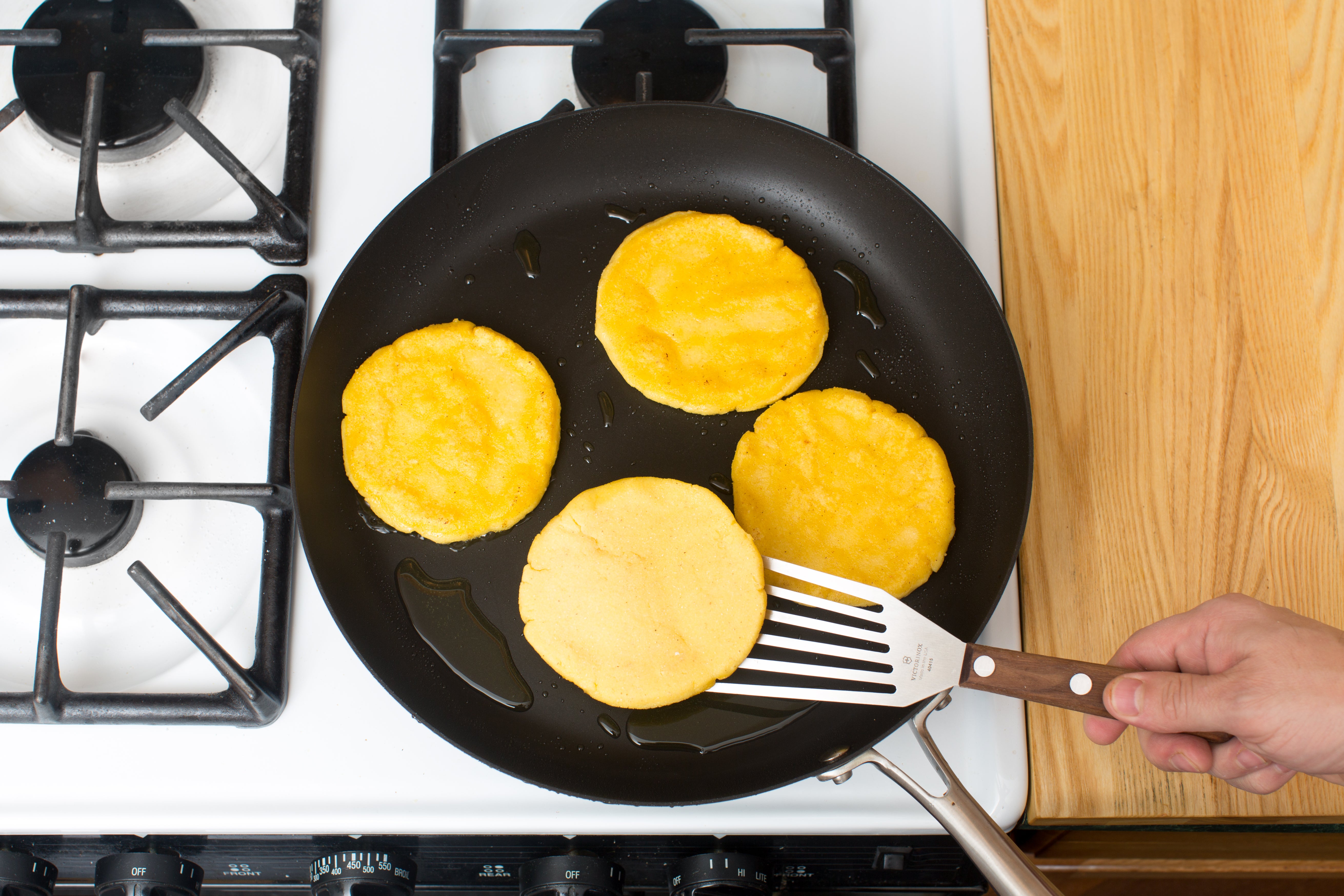 recipe-step-image-Cook the arepas & plate your dish:}
