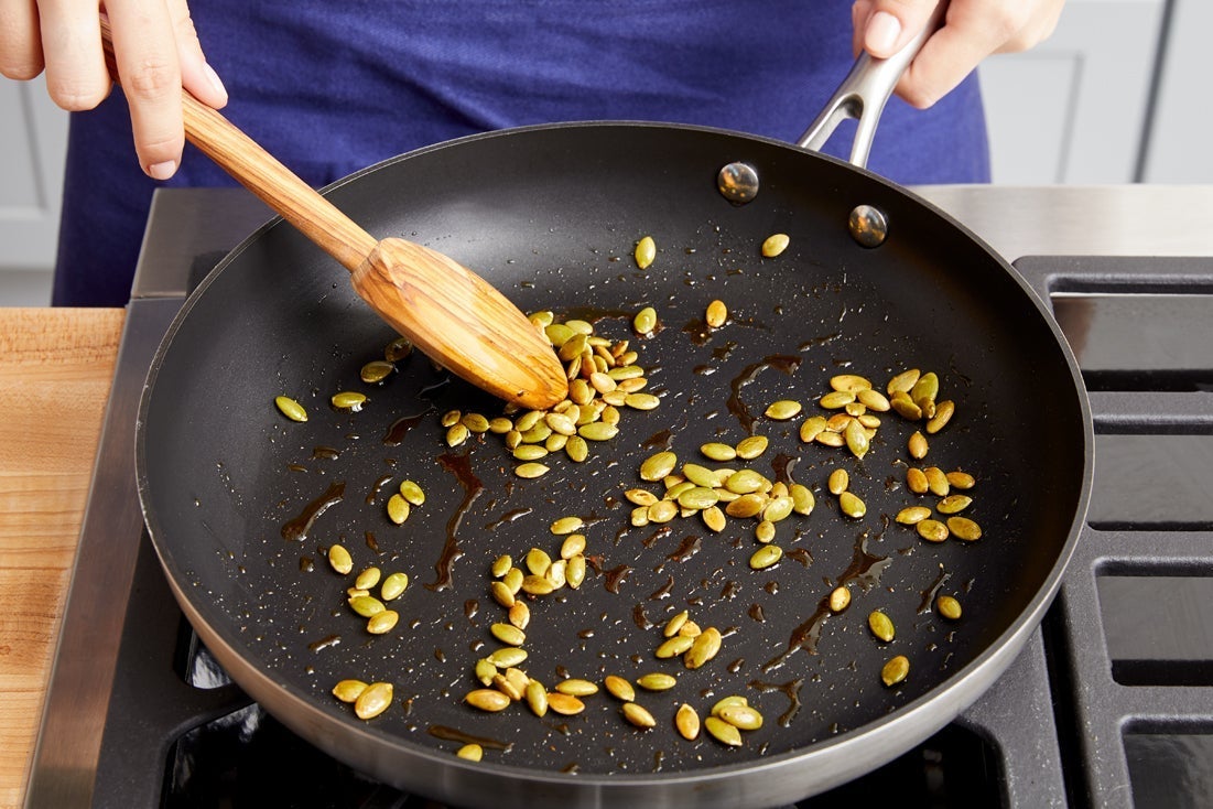 recipe-step-image-Toast the pepitas}