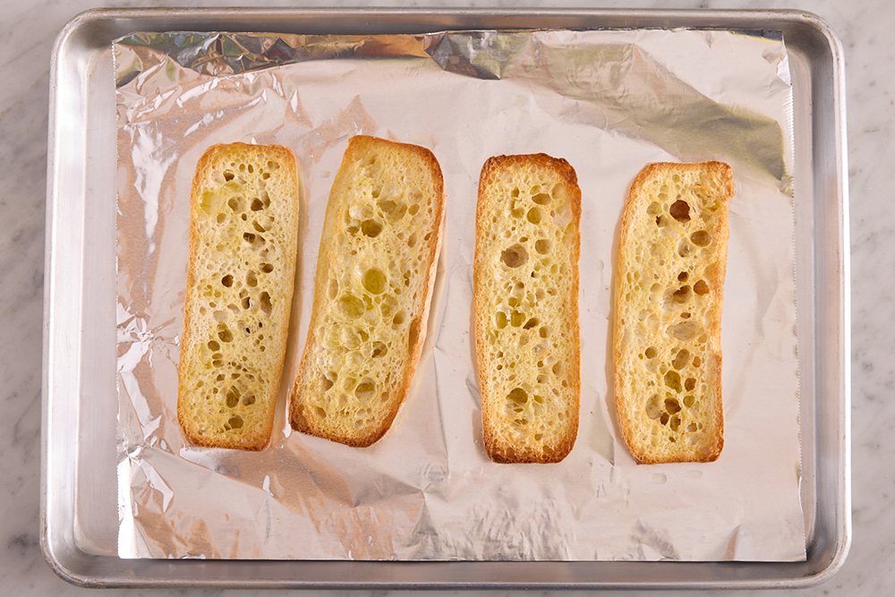 recipe-step-image-Toast the baguettes & serve your dish}