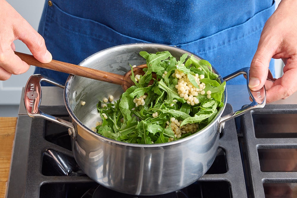 recipe-step-image-Finish the couscous & serve your dish}