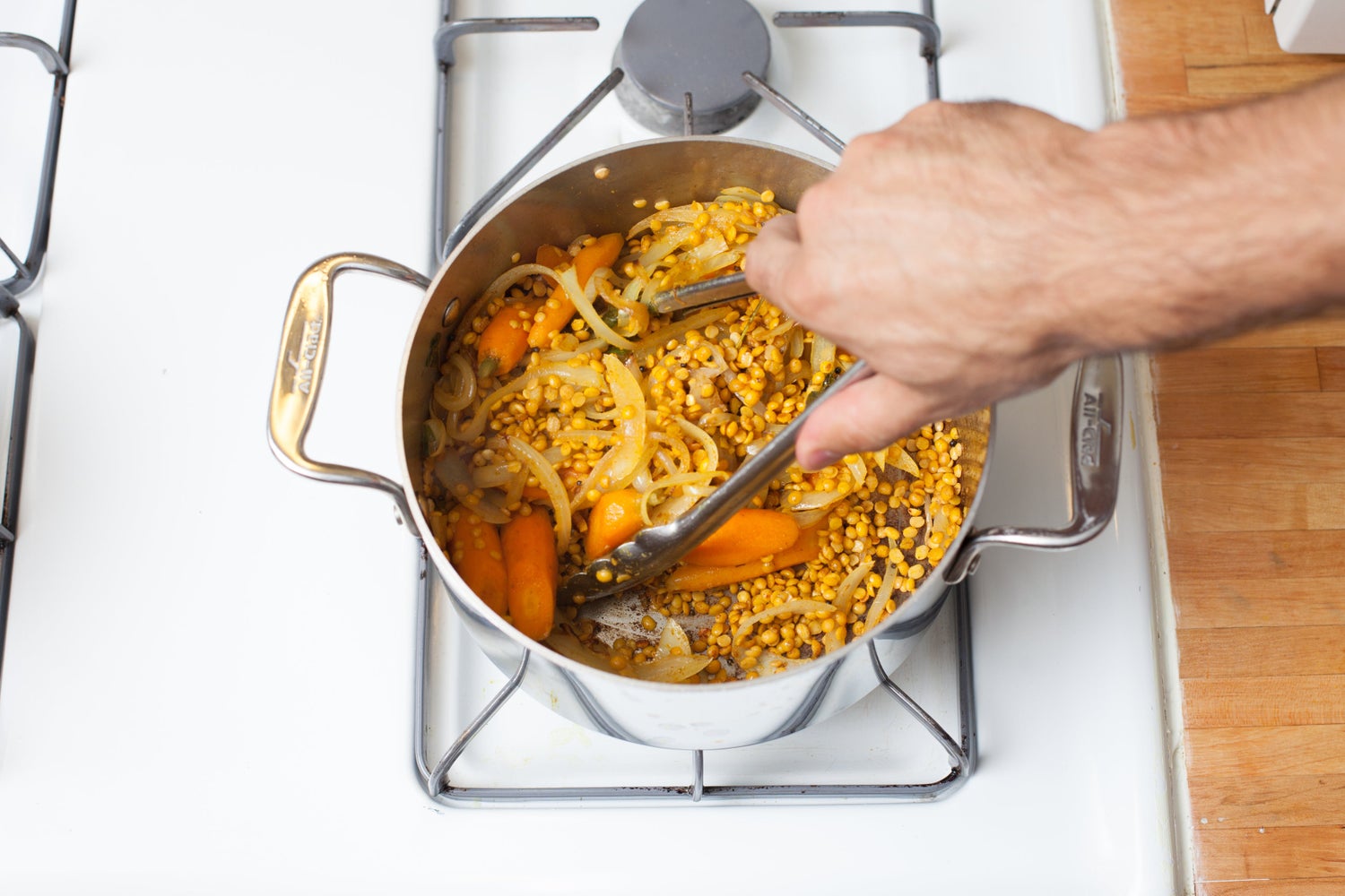 recipe-step-image-4.	Add the vegetables & lentils:}