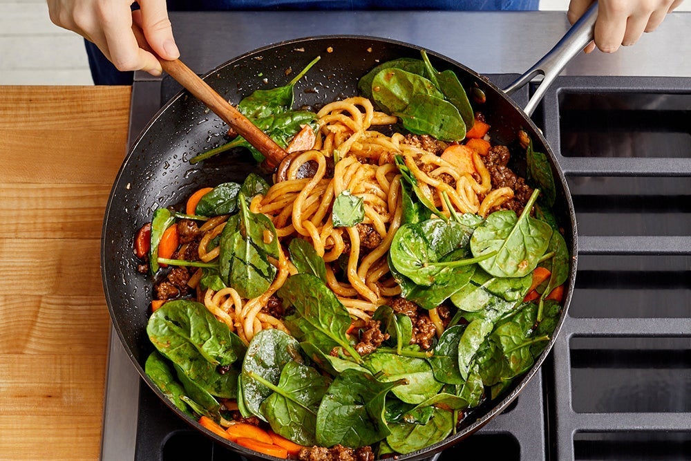 recipe-step-image-Finish the stir-fry & serve your dish}