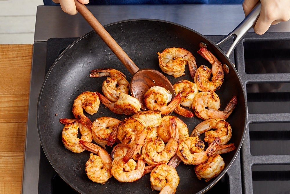 recipe-step-image-Cook the shrimp & serve your dish}