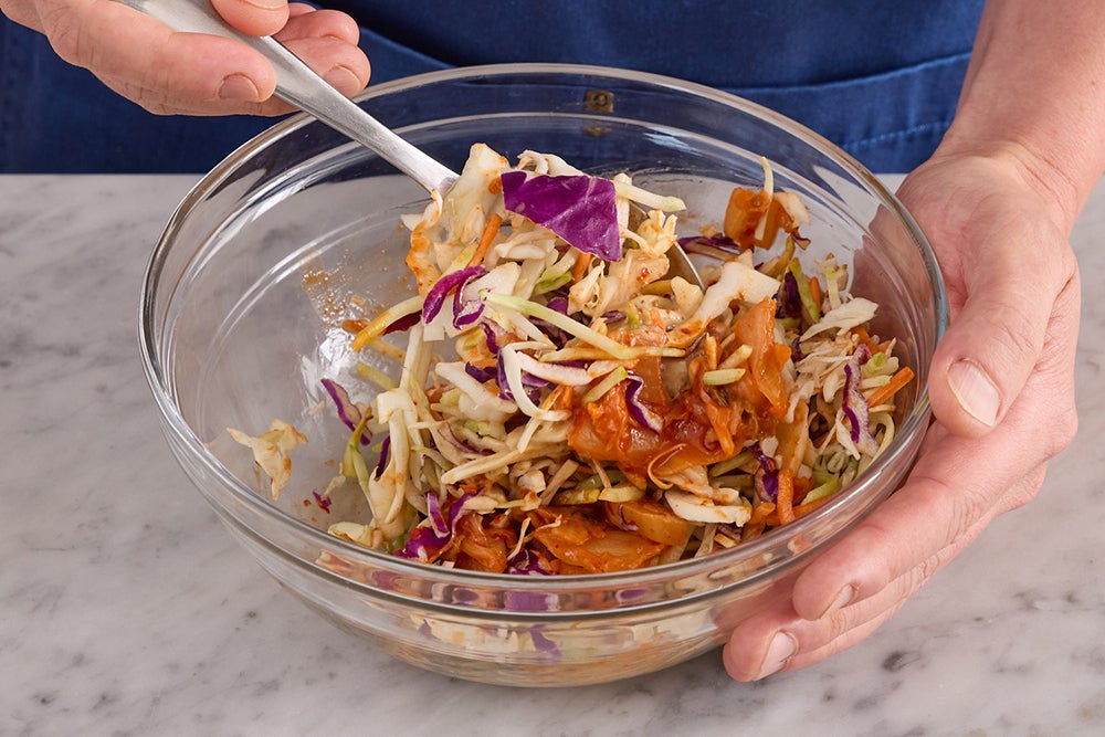 recipe-step-image-Make the kimchi slaw & serve your dish}