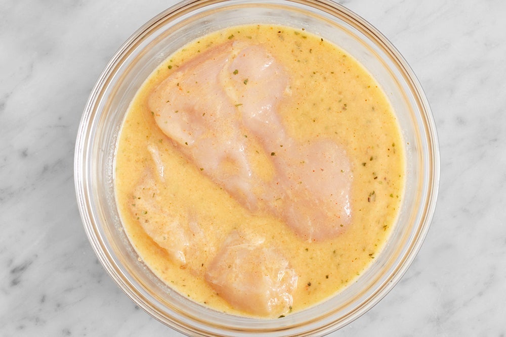 recipe-step-image-Pound & marinate the chicken }