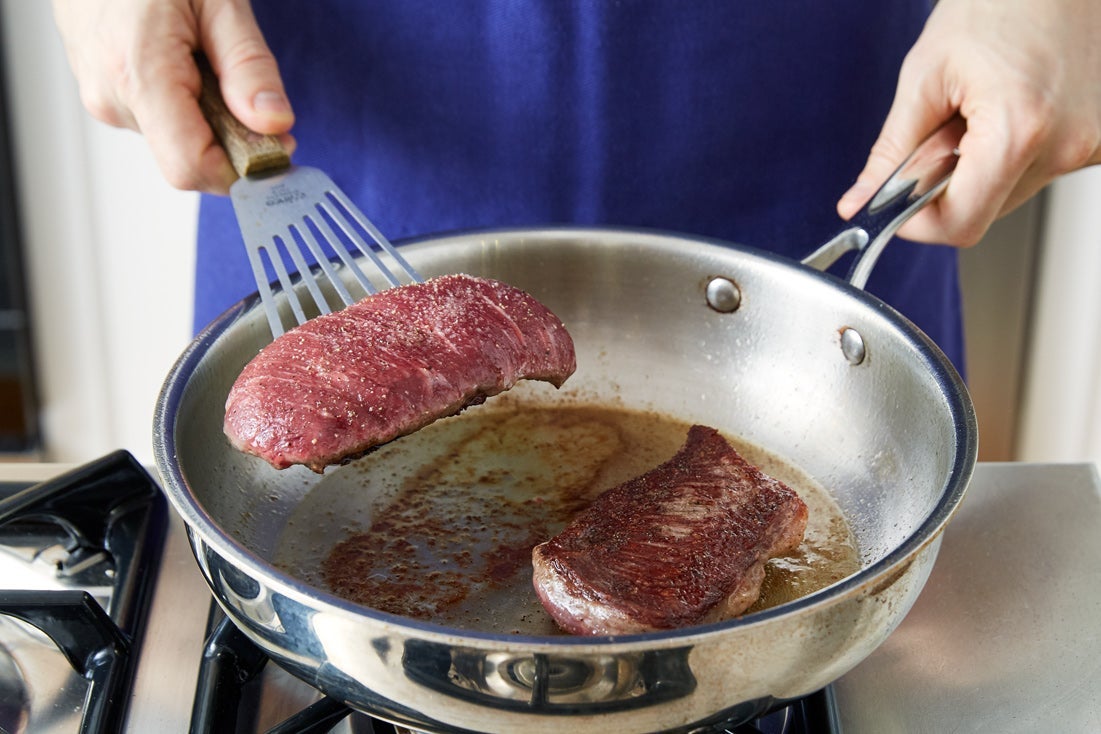 recipe-step-image-Cook the steaks:}