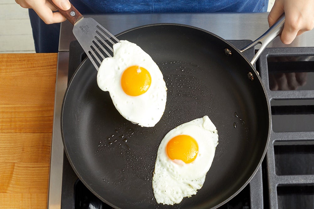recipe-step-image-Fry the eggs & serve your dish }