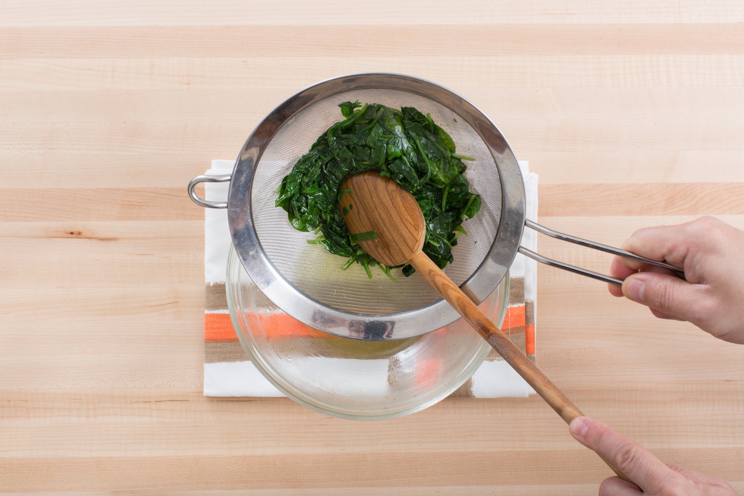 recipe-step-image-Cook & drain the spinach:}