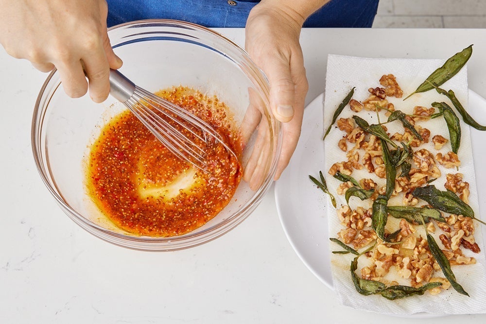 recipe-step-image-Toast the walnuts & make the vinaigrette}