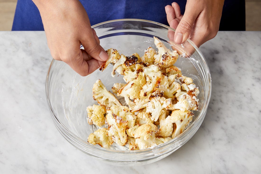 recipe-step-image-Dress the cauliflower & serve your dish:}