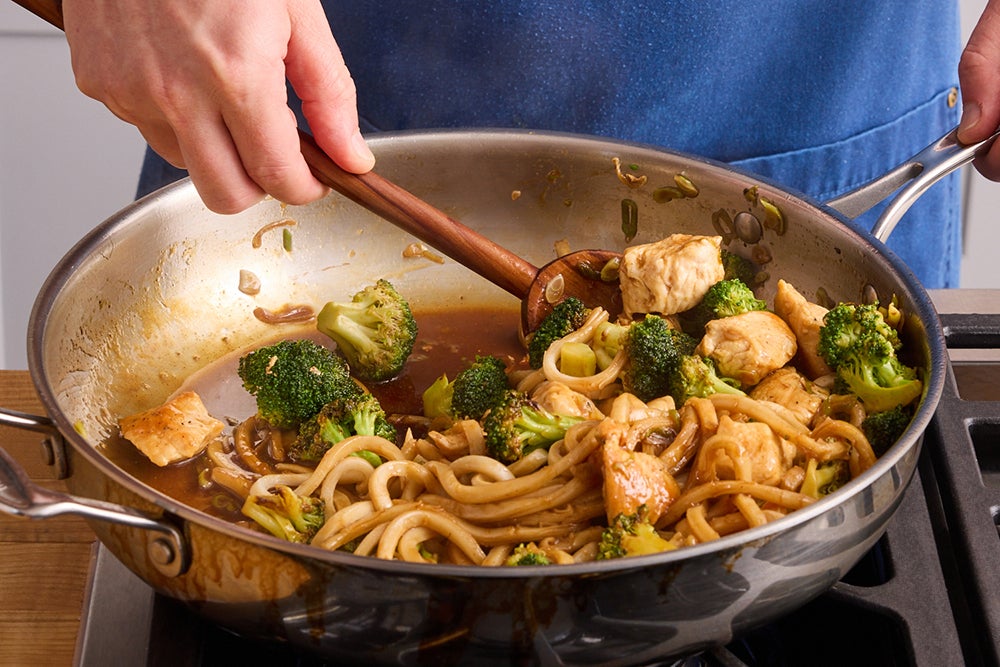 recipe-step-image-Finish the stir-fry & serve your dish}