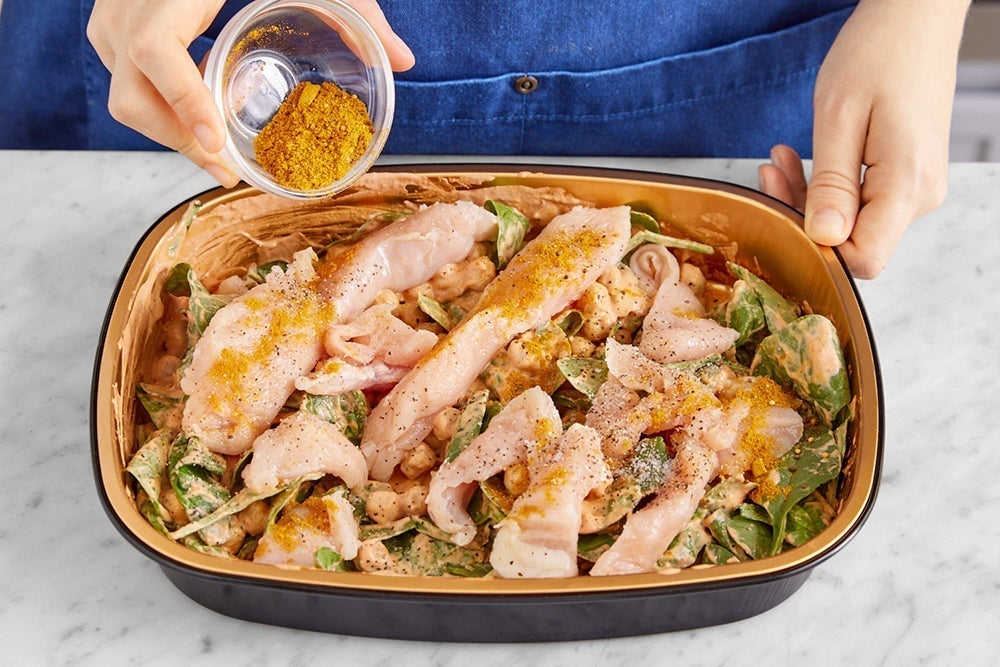 recipe-step-image-Add the chicken & bake the trays}