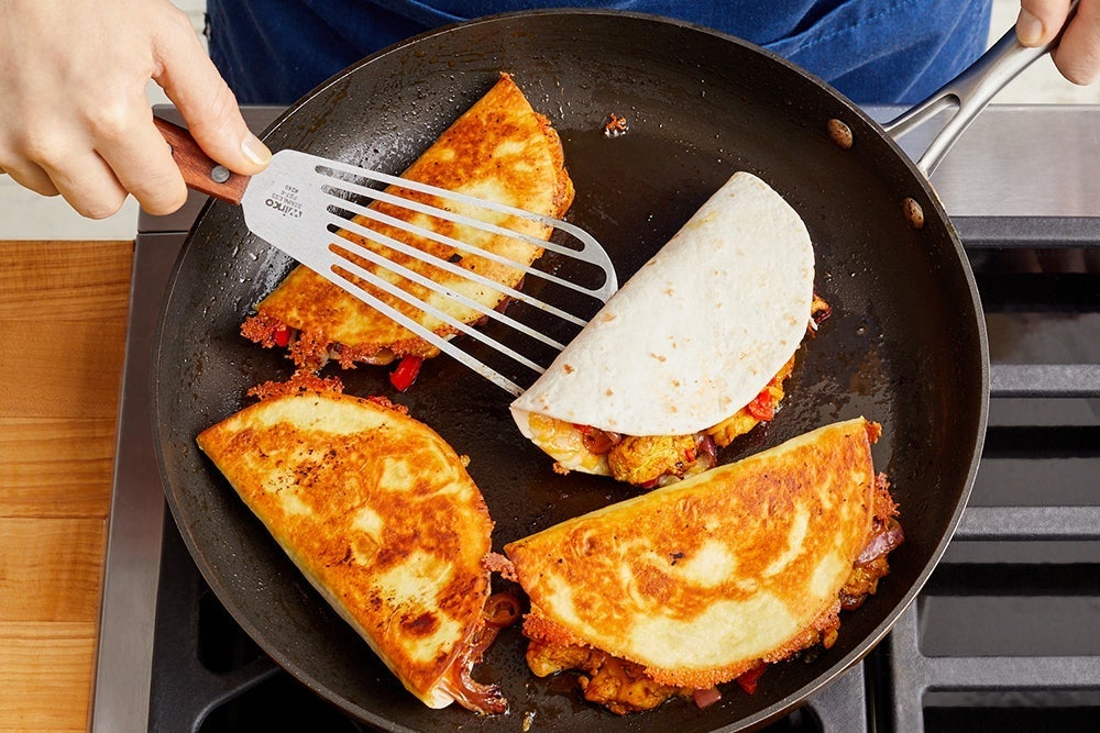 recipe-step-image-Cook the quesadillas & serve your dish}