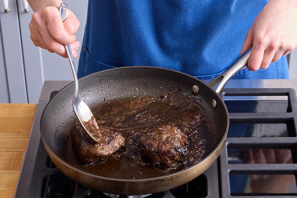 recipe-step-image-Cook the steaks & serve your dish}