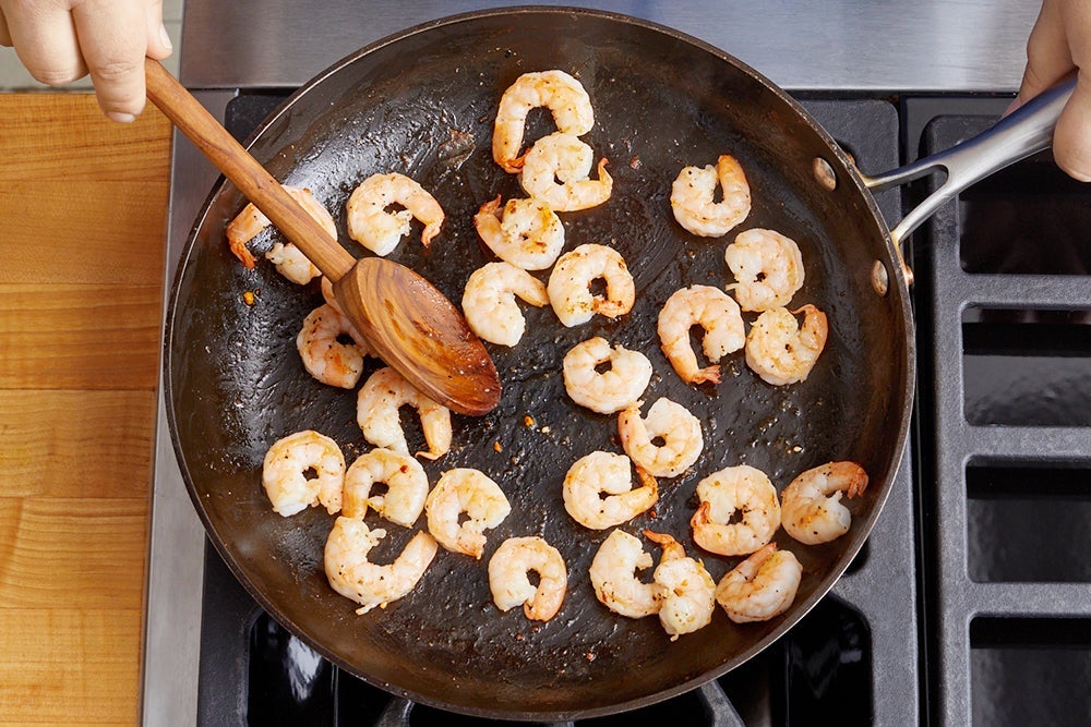 recipe-step-image-Cook the shrimp & serve your dish}