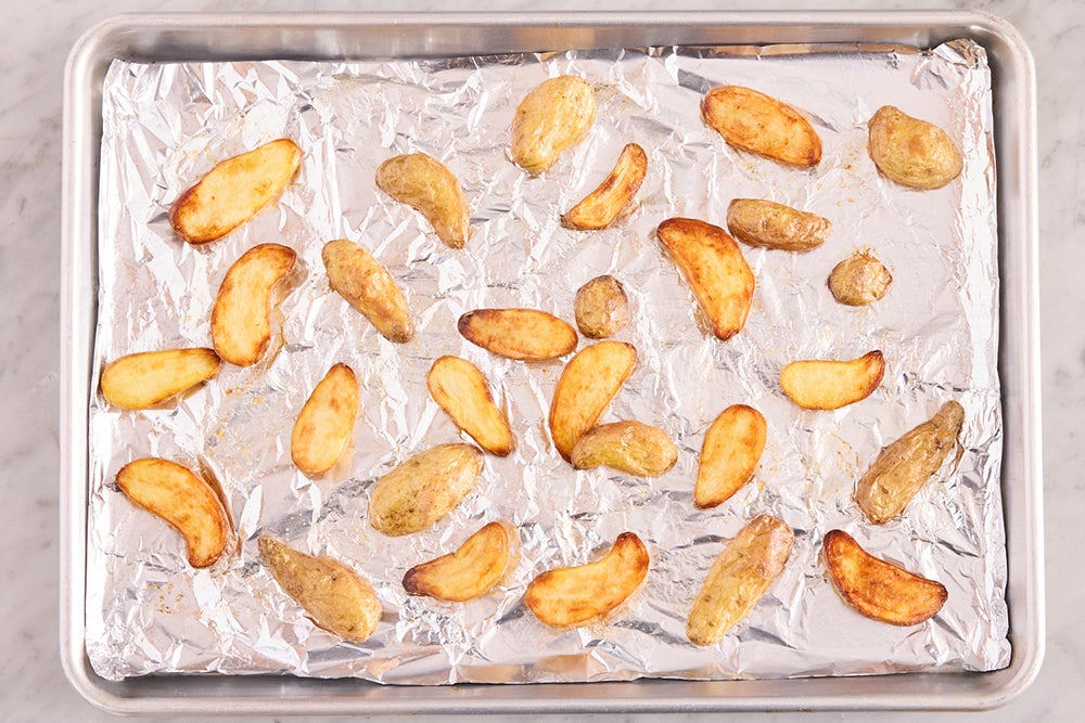 recipe-step-image-Roast & finish the potatoes}