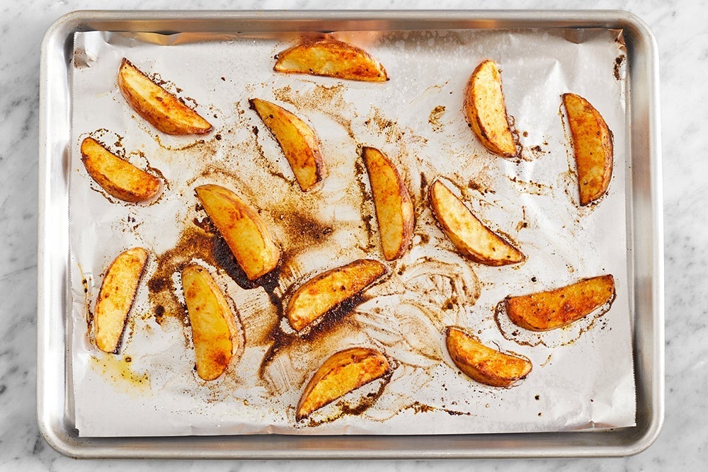 recipe-step-image-Roast the potato wedges}