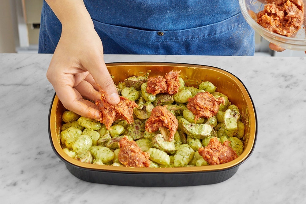 recipe-step-image-Add the sausage & bake the tray}