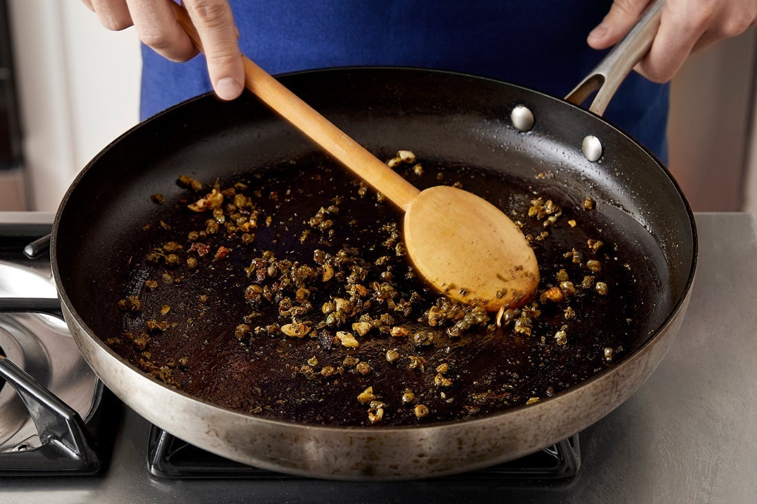 recipe-step-image-Make the garlic-caper topping}