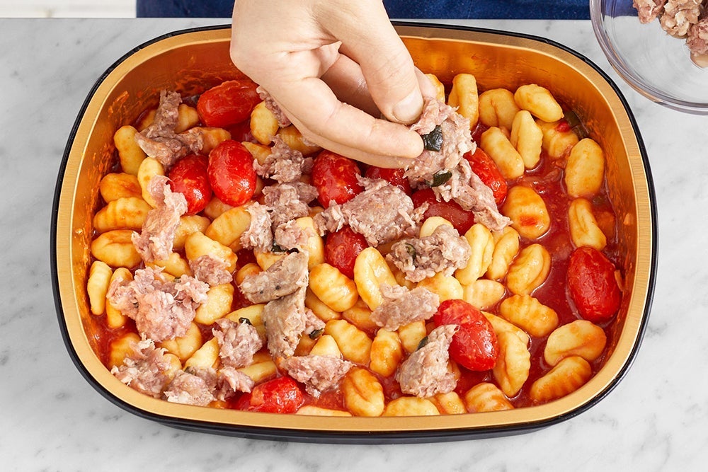 recipe-step-image-Add the sausage & bake the tray }