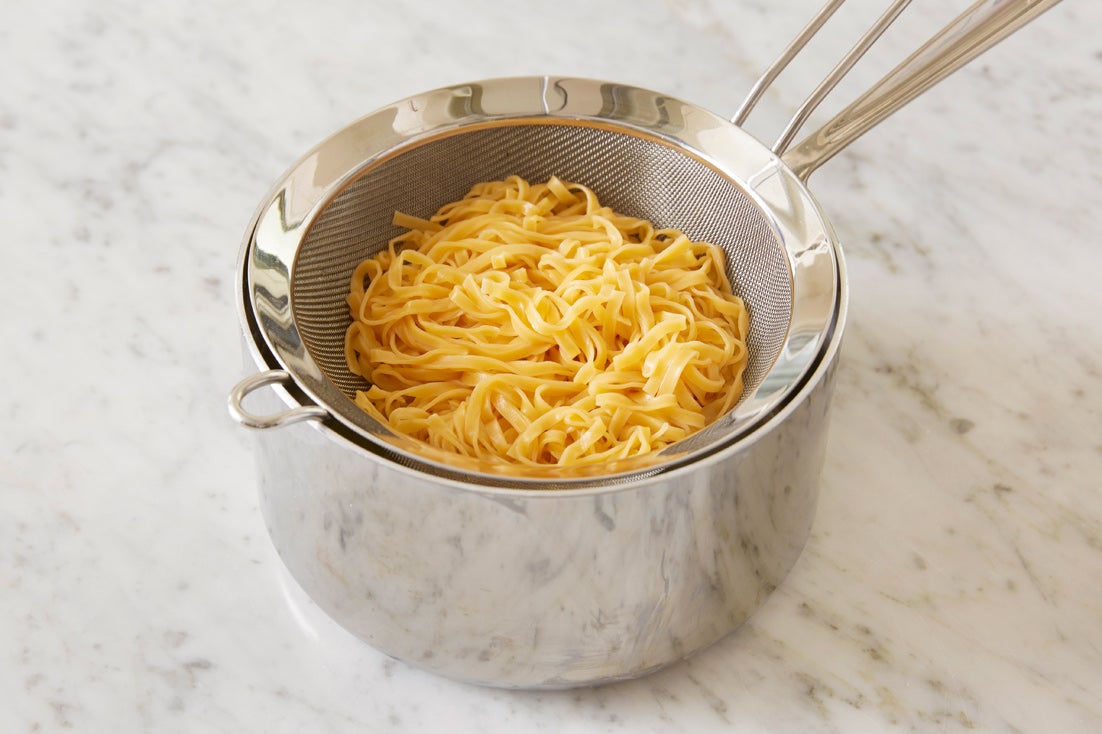 recipe-step-image-Cook & finish the noodles:}
