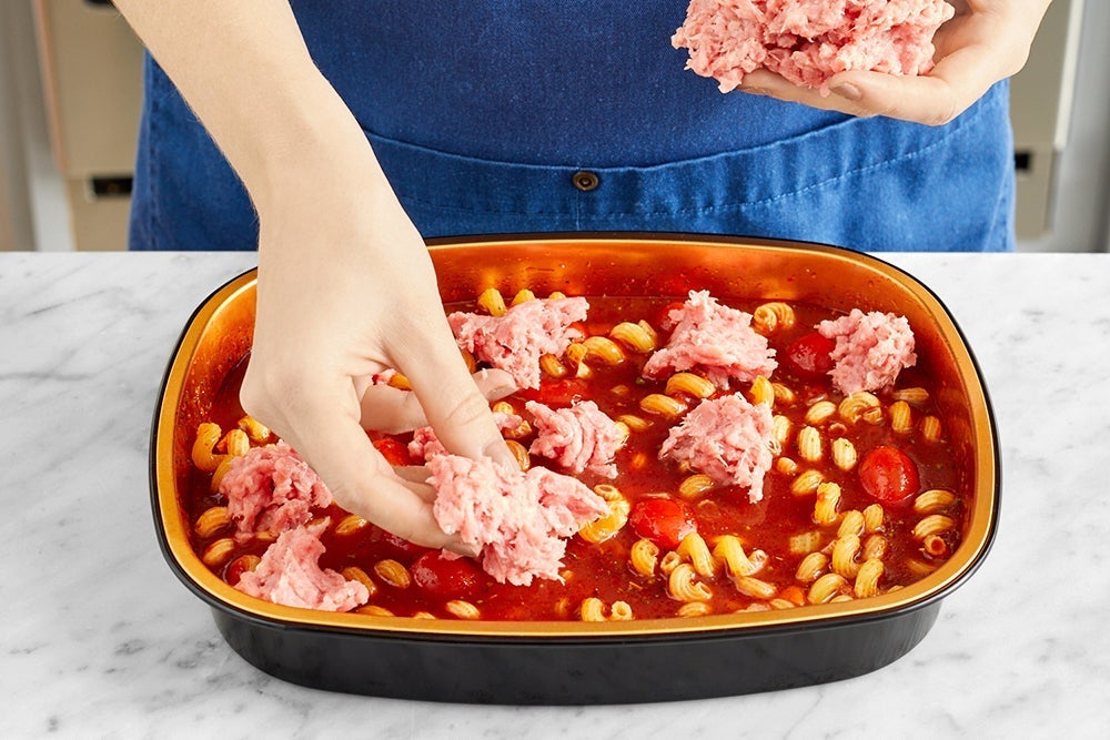 recipe-step-image-Add the turkey & bake the tray}